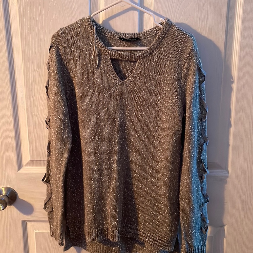 Grey womens sweater with ties on the side. Size M.